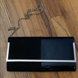 ALDO black clutch purse with gold accents